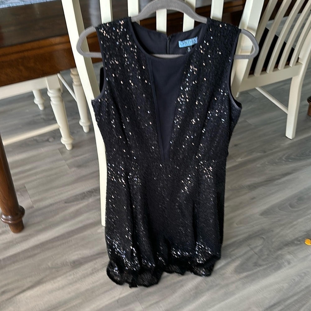 Black sequin above knee dress